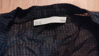 Camisa transparente con volante