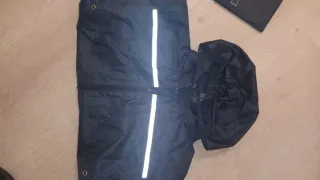Chaqueta y pantalón impermeable reflectante