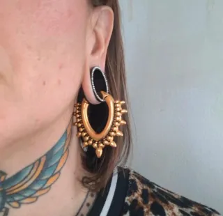 Pesos para dilataciones dorados con púas