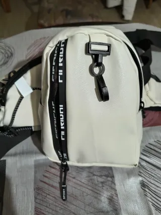 Riñonera y bandolera blanca y negra