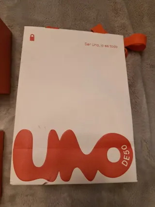 Pulsera Uno d 50 3 vueltas de cuero bañadas en oro