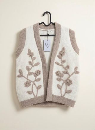 Chaleco de punto floral beige y blanco