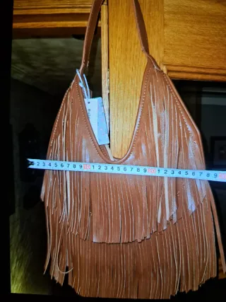 Bolso marrón con flecos