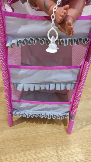 Cuna-trona de juguete rosa