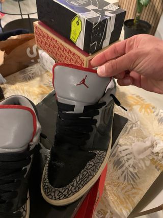 Jordan 1 Low Negro Gris