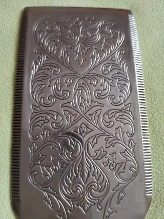 Paleta para servir de metal con baño de plata.