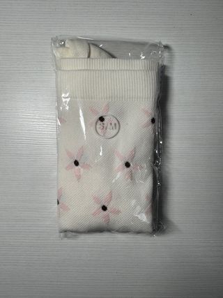 Calcetines altos azul claro con hojas