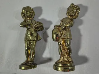 Pareja de figuras Infantiles de metal.