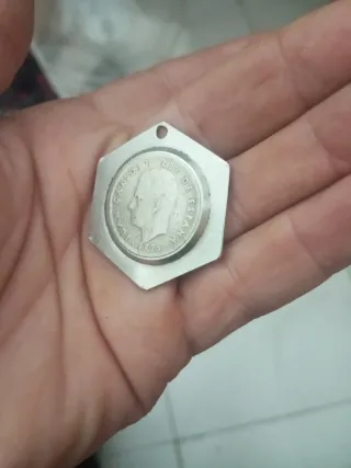 Moneda Franco 1957 y Rey Juan Carlos 1975