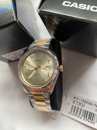 Reloj Casio Gris y Dorado - Nuevo con Caja
