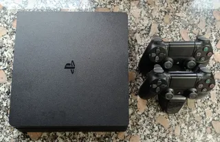 PS4 (PlayStation 4) + 5 juegos + 2 mandos
