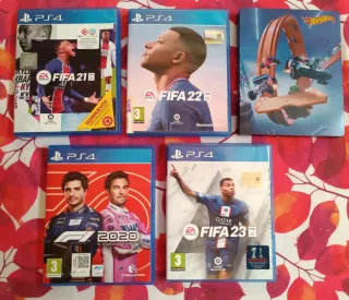 PS4 (PlayStation 4) + 5 juegos + 2 mandos