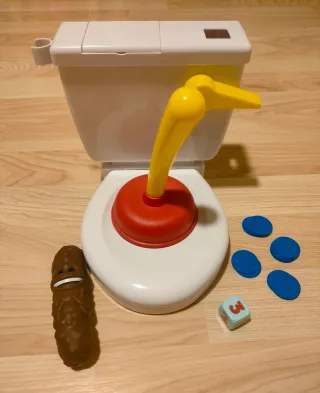 Juego Caca Boom! Inodoro con todos los accesorios.