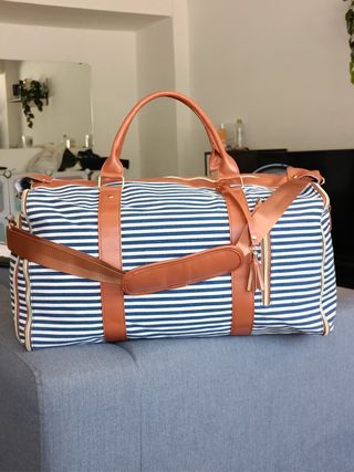 Bolsos de viaje beige y marrón