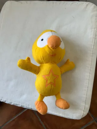 Peluche amarillo con estrella para bebés