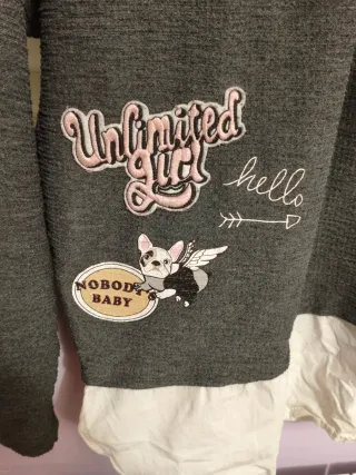 Jersey gris con detalle blanco