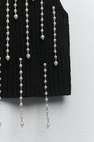 Top sin mangas. Tejido de chenilla y perlas. De Za