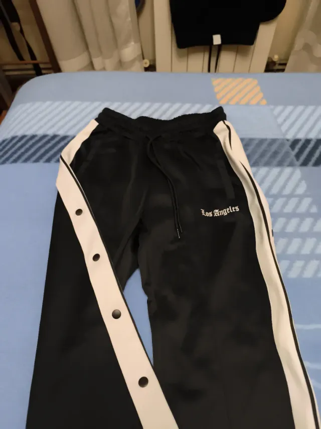 Pantalón chándal hombre botones laterales