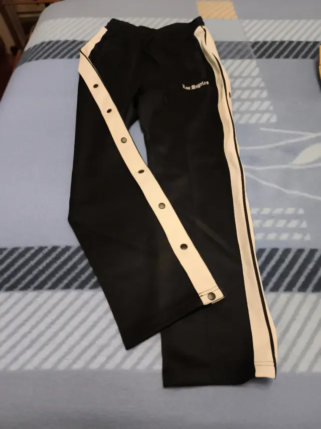 Pantalón chándal hombre botones laterales