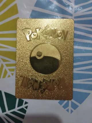 Carta Pokémon Charizard GX Oro