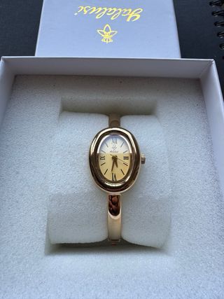 Orologio elegante color oro