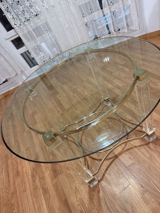 Mesa de comedor redonda de cristal y metal