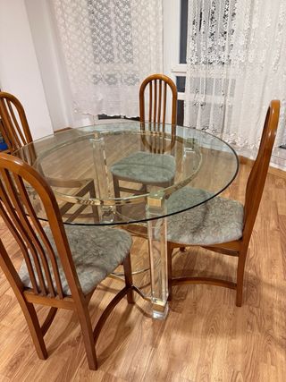 Mesa de comedor redonda de cristal y metal