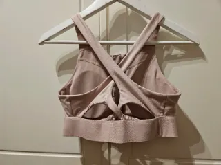 Top deportivo sexy rosa palo con cremallera