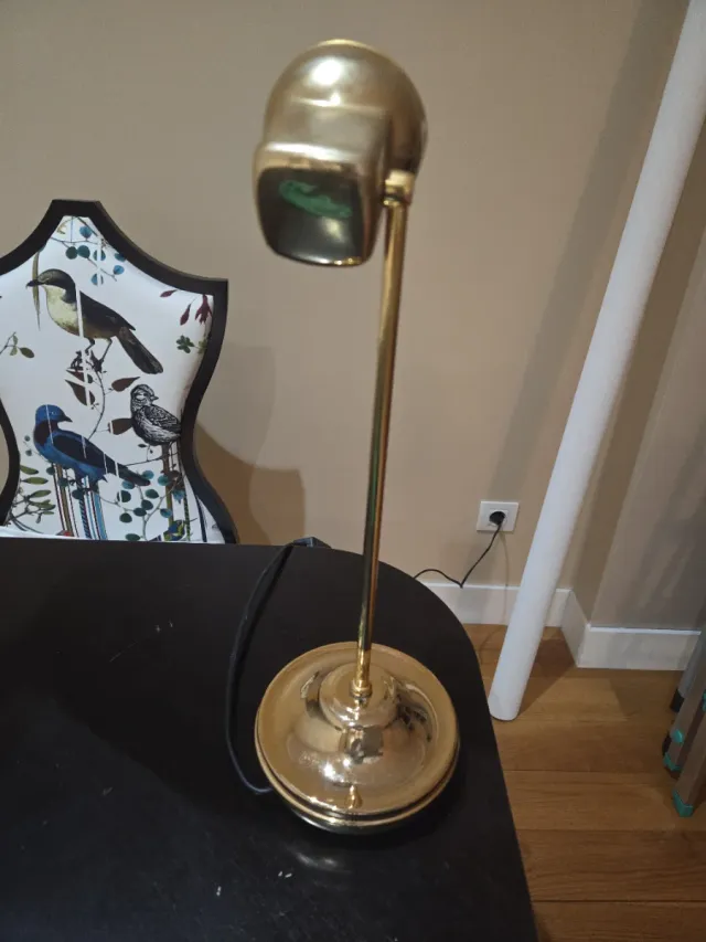 Lámpara de lectura dorada