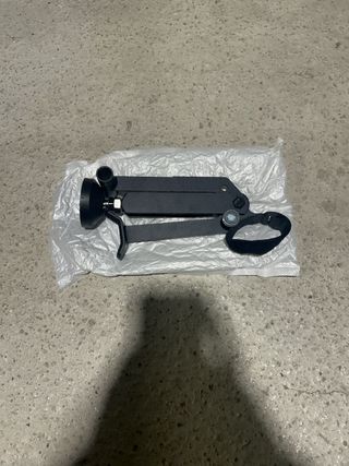 Soporte lateral engrasado cadena moto