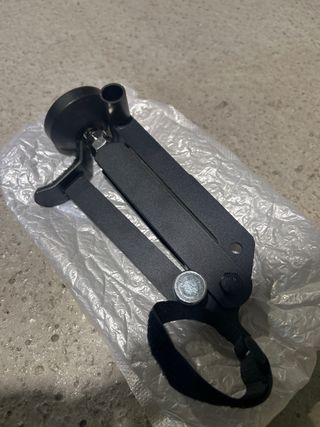 Soporte lateral engrasado cadena moto