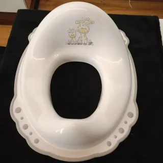 Reductor de baño infantil jirafas