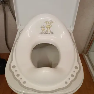 Reductor de baño infantil jirafas