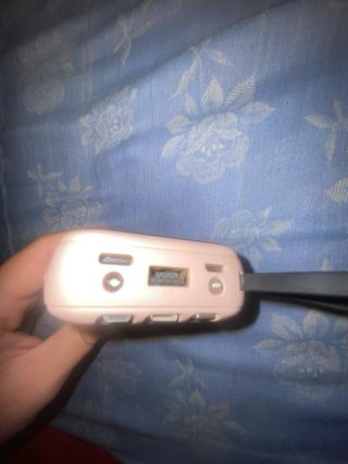 Batería externa rosa con asa