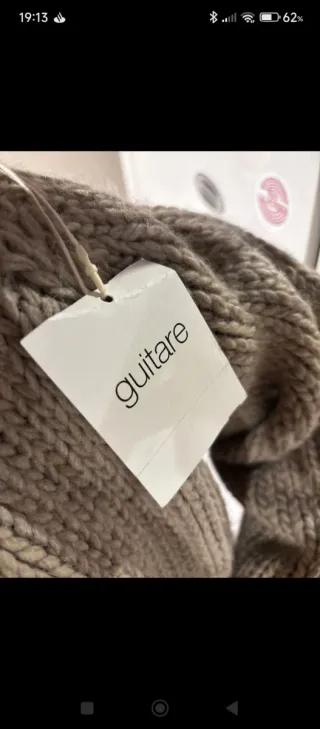 Jersey cuello alto oversize beige/gris