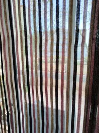 Cortina tipo estor de cuerda a rallas