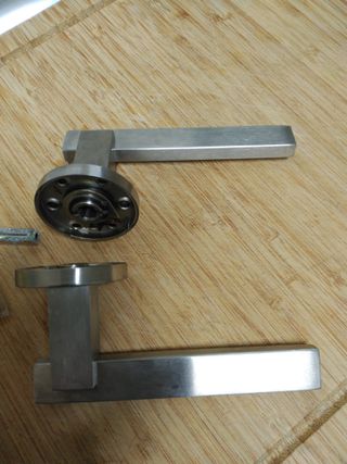 Manivela puerta de paso, de roseta.