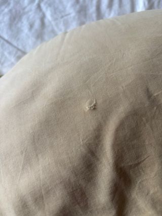 Cojín de lactancia amarillo