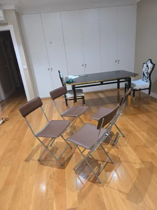 Sedie pieghevoli in pelle e metallo