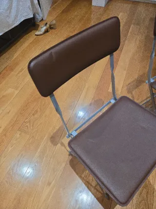 Sedie pieghevoli in pelle e metallo