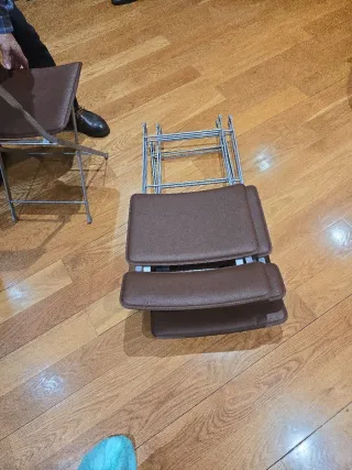 Sedie pieghevoli in pelle e metallo