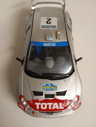 Réplica Peugeot 206 WRC a escala 1/18