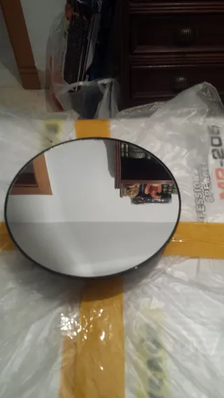 Expositor giratorio eléctrico y pilas con espejo