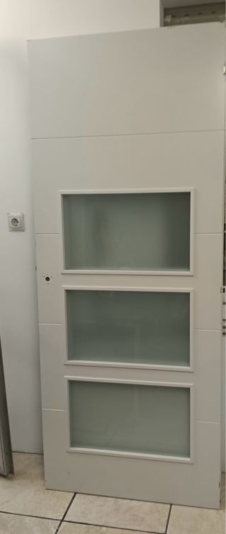 Conjunto de puerta 2 con cristales y 2 lisas.