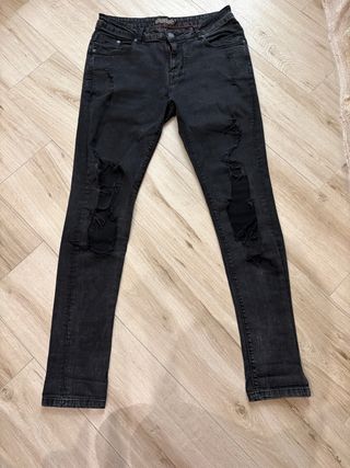 Jeans uomo neri strappati