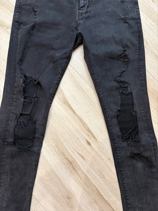 Jeans uomo neri strappati