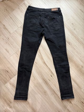Jeans uomo neri strappati