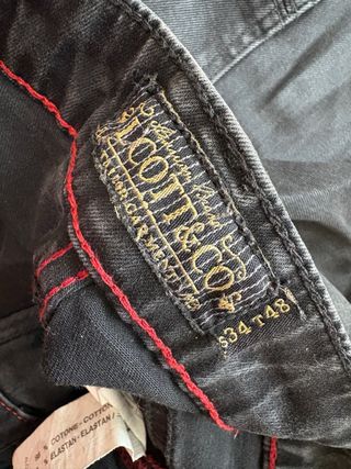 Jeans uomo neri strappati