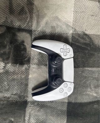 Mando PS5 Roto y base de carga