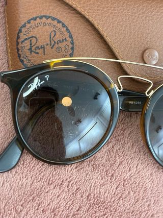 Gafas de sol Ray-Ban negras y marrones